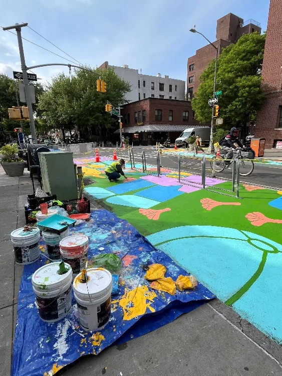 Installing street murals for Astoria 31st Ave Open Streets, Queens, NY (May 2026)