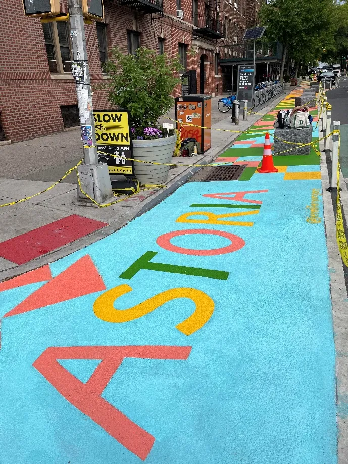 Installing street murals for Astoria 31st Ave Open Streets, Queens, NY (May 2026)