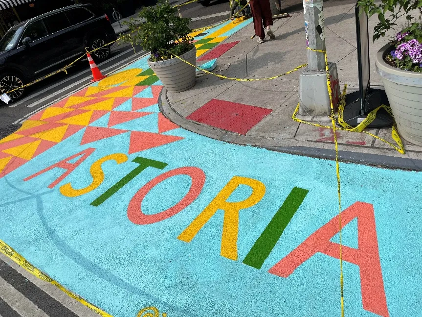 Installing street murals for Astoria 31st Ave Open Streets, Queens, NY (May 2026)